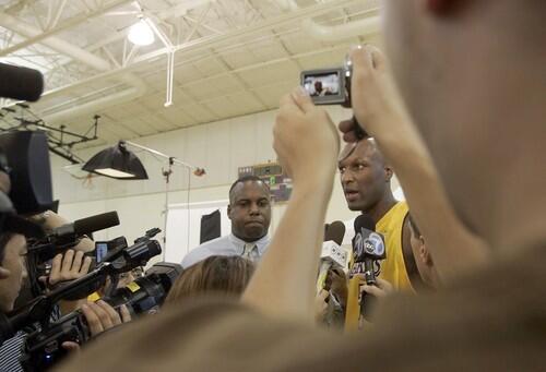 Lamar Odom talks to the press during Lakers Media Day held at their practice facility in El Segundo on Monday.