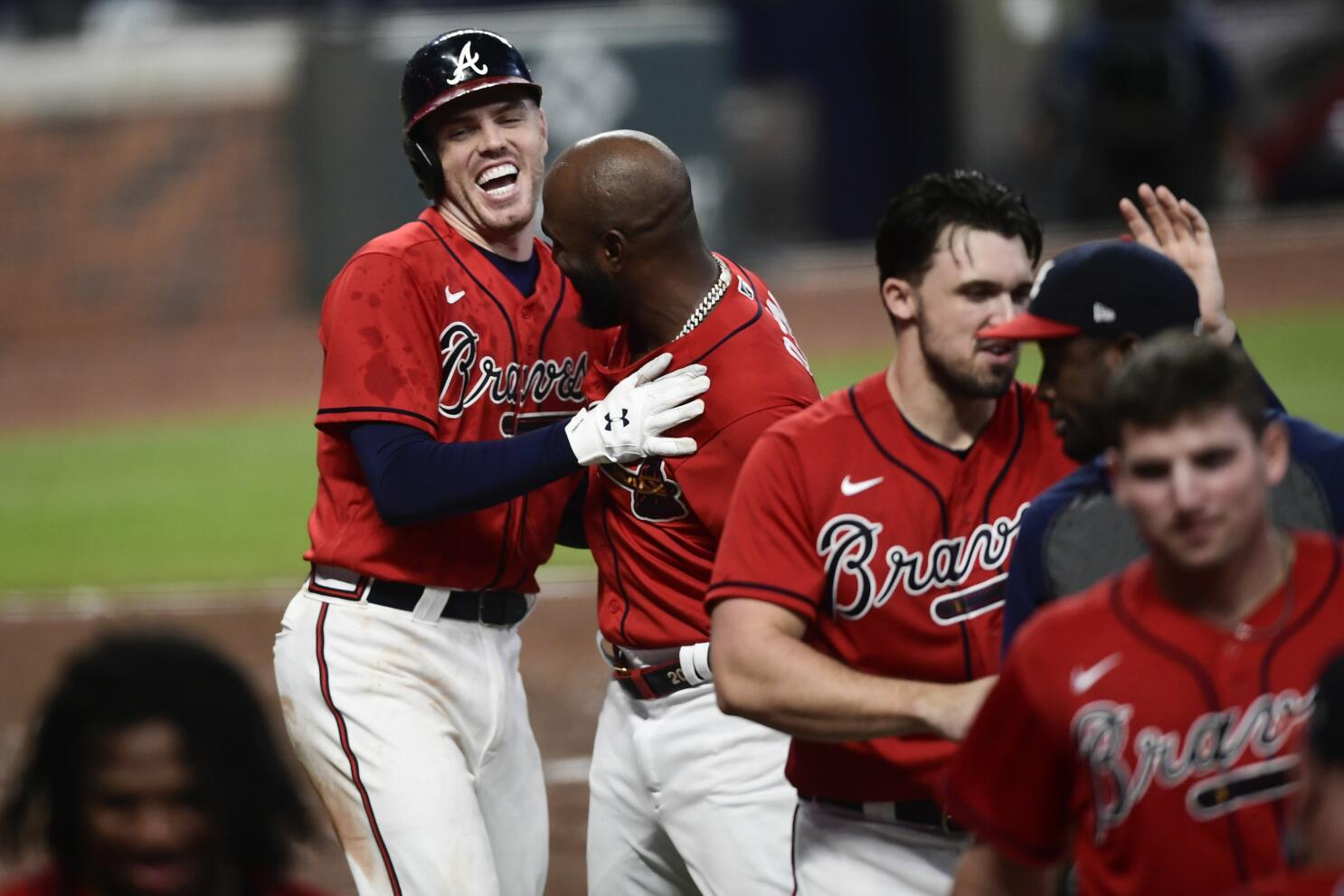 Atlanta Braves first baseman Freddie Freeman sits in the dugout