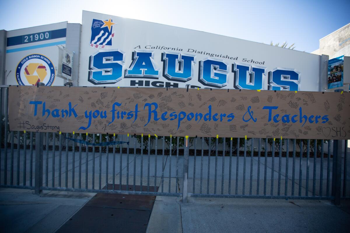 A banner hanging outside Saugus High School thanks first responders and teachers on Nov. 18, 2019.