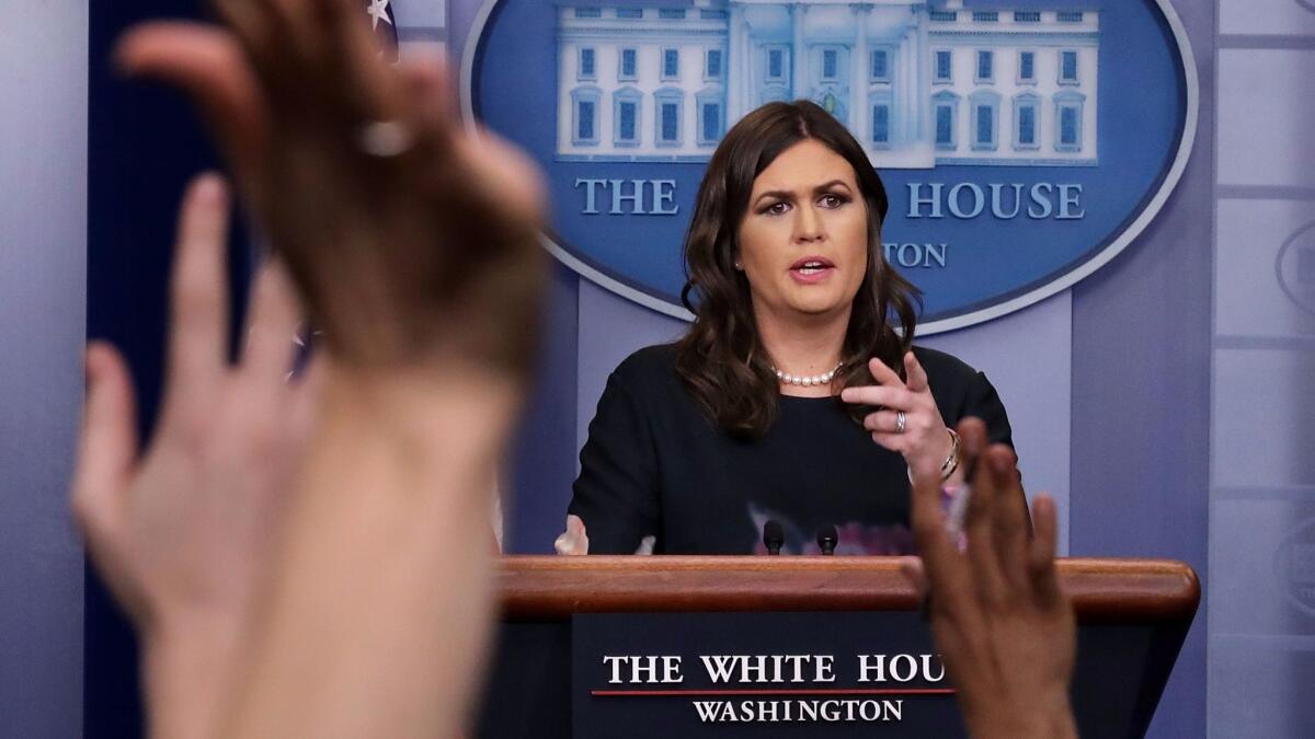 White House Press Secretary Sarah Huckabee Sanders takes reporters' questions during a news conference on Nov. 17.