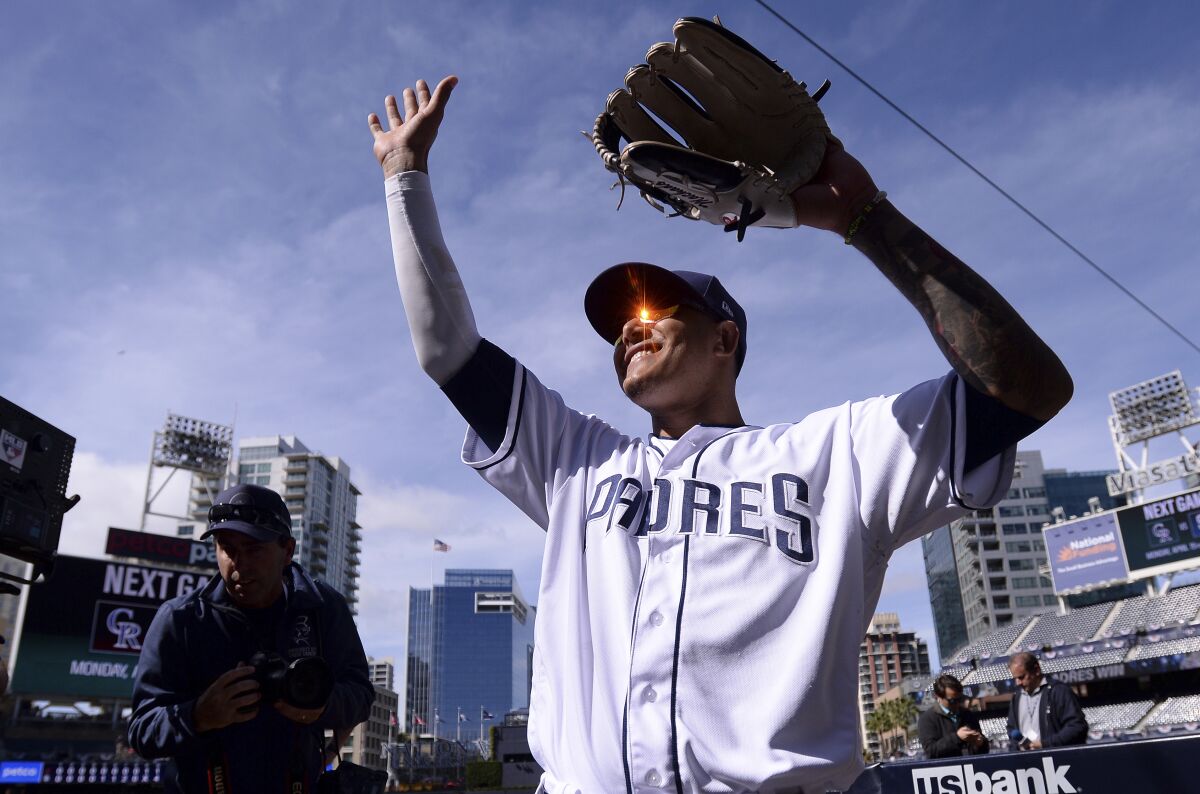 The Padres' Manny Machado acknowledges the crowd following the baseball game against the Arizona Diamondbacks Thursday, April 4, 2019, in San Diego. The Padres won 4-1.