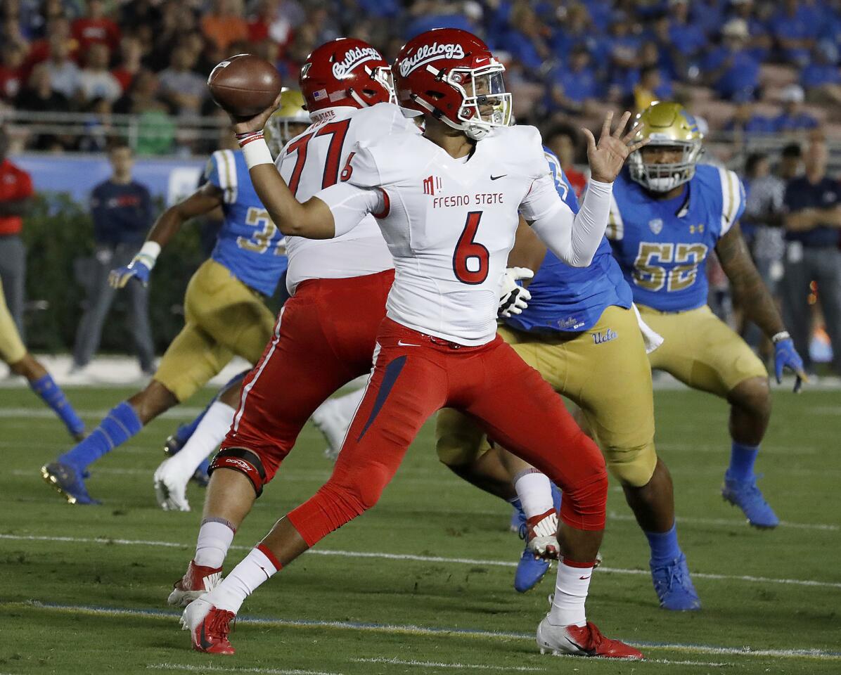 Fresno State quarterback Marcus McMaryion throws downfield against the Bruins in the first quarter on Saturday at the Rose Bowl.