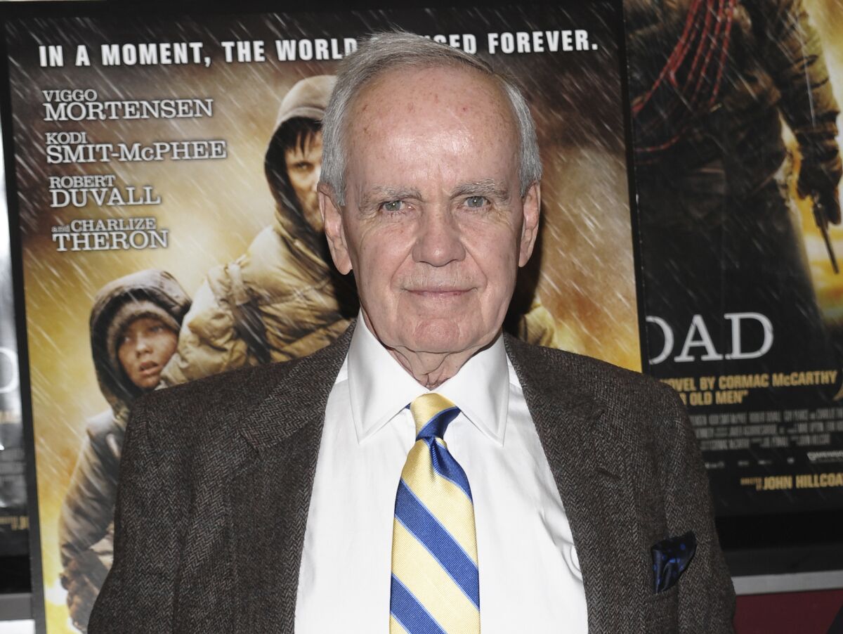FILE - Author Cormac McCarthy attends the premiere of "The Road" in New York on Nov. 16, 2009. McCarthy has two novels coming out this fall, his first fiction releases since the Pulitzer Prize-winning “The Road” in 2006. Publisher Alfred A. Knopf announced Tuesday, March 8, 2022, that “The Passenger,” would come out Oct. 25 and “Stella Maris,” a prequel to “The Passenger” set eight years earlier, is scheduled for Nov. 22. The two works will be available as a box set on Dec. 6. (AP Photo/Evan Agostini, File)
