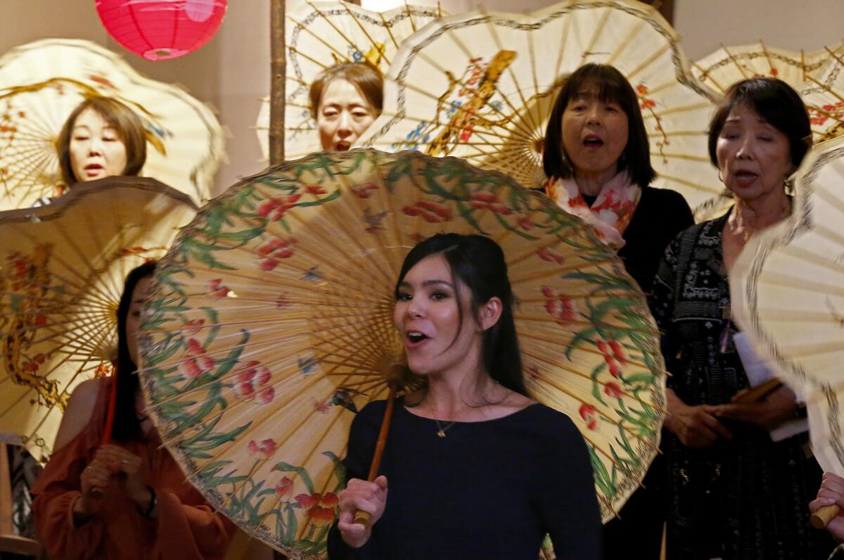 Janet Todd, center, Cio-Cio-san in the bilingual production, sings during a rehearsal.