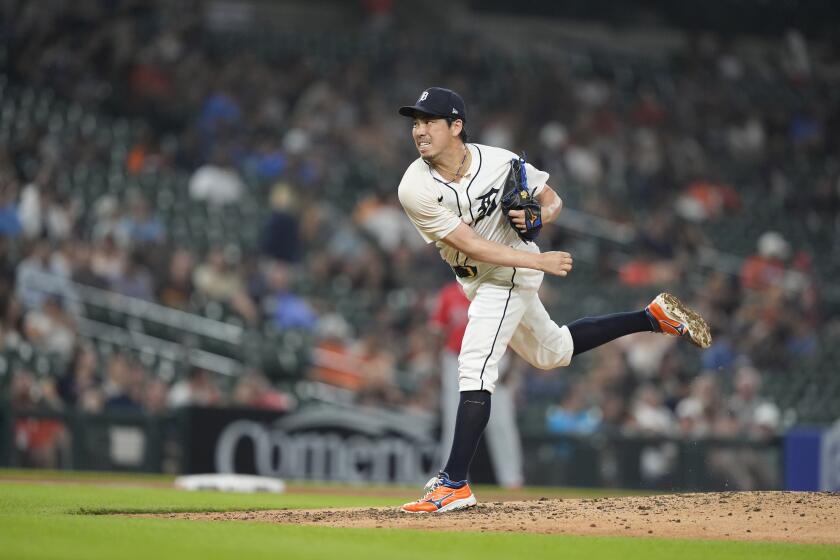 Detroit Tigers pitcher Kenta Maeda throws during the third inning of a baseball game against the Los Angeles Angels, Wednesday, Aug. 28, 2024, in Detroit. (AP Photo/Carlos Osorio)