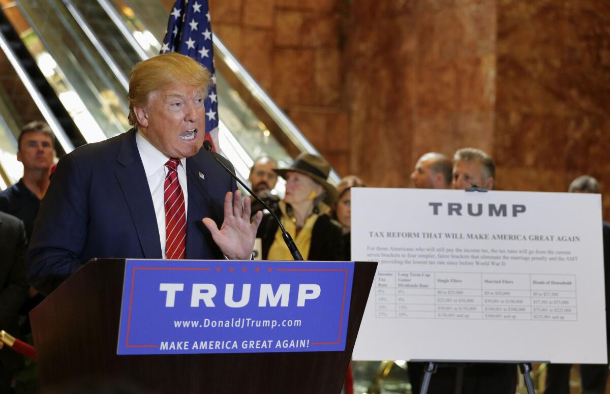 Republican presidential candidate Donald Trump talks about his tax plan in New York.