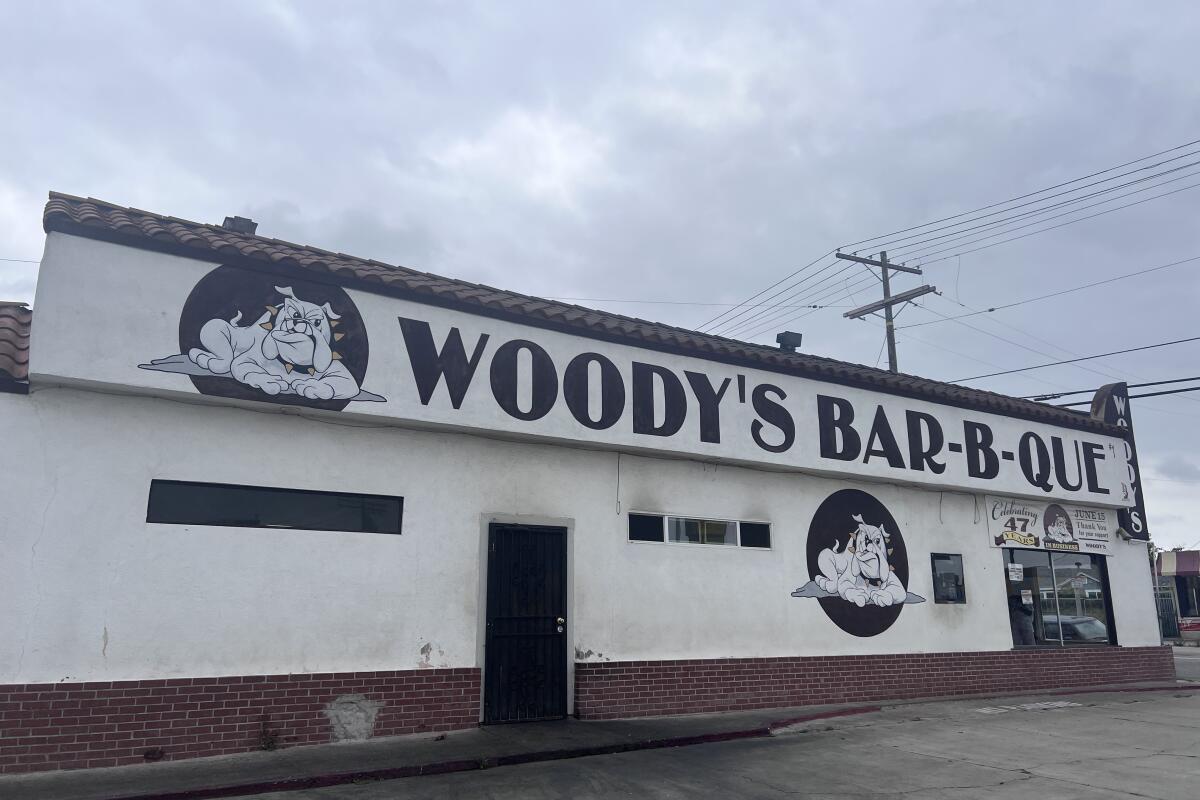 The Inflation Fighter lunch at Woody's includes pork rib tips, a half chicken link and a side of macaroni or potato salad.
