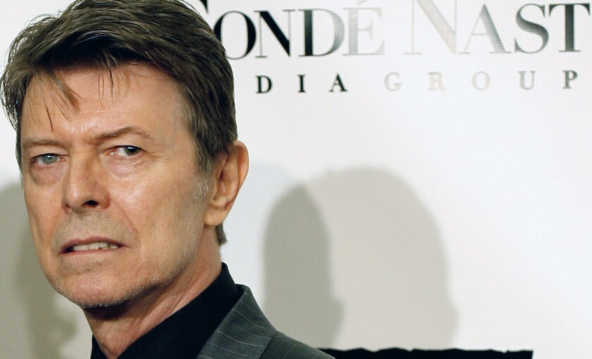 FILE - David Bowie arrives at the Fourth Annual Black Ball Concert for "Keep A Child Alive" on Oct. 25, 2007, in New York. Warner Chappell Music has purchased the global music publishing rights to David Bowie’s song catalog. The deal includes hundreds of songs such as “Space Oddity,” “Ziggy Stardust,” “Fame,” “Modern Love” and “Let’s Dance.” (AP Photo/Stephen Chernin, File)