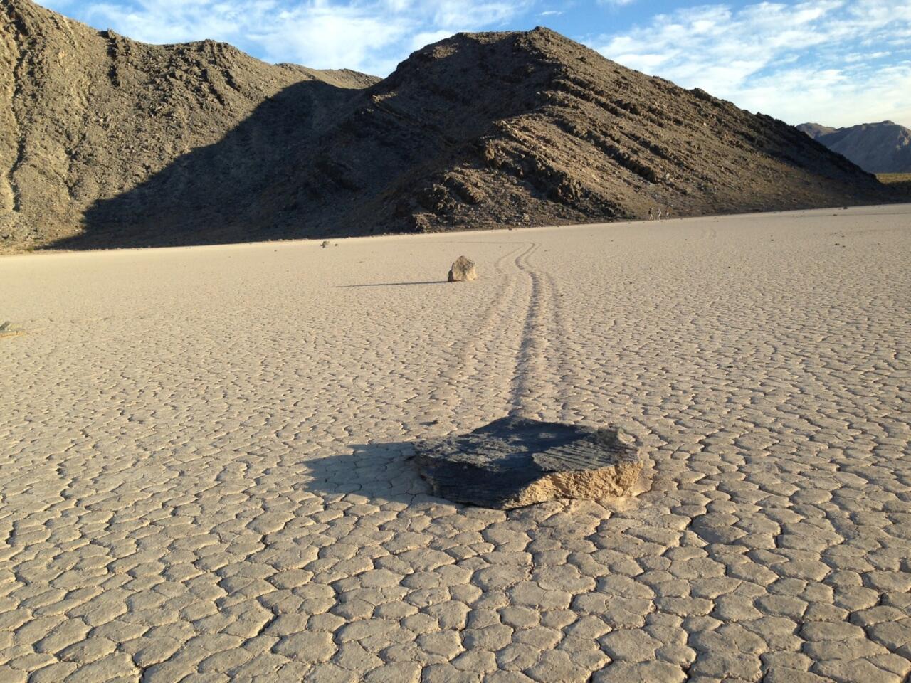 Newly published findings resolve the mystery of the moving rocks like this one that have left trails on the Racetrack playa in Death Valley National Park.