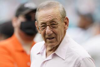 Miami Dolphins owner Stephen Ross watches the end of a game