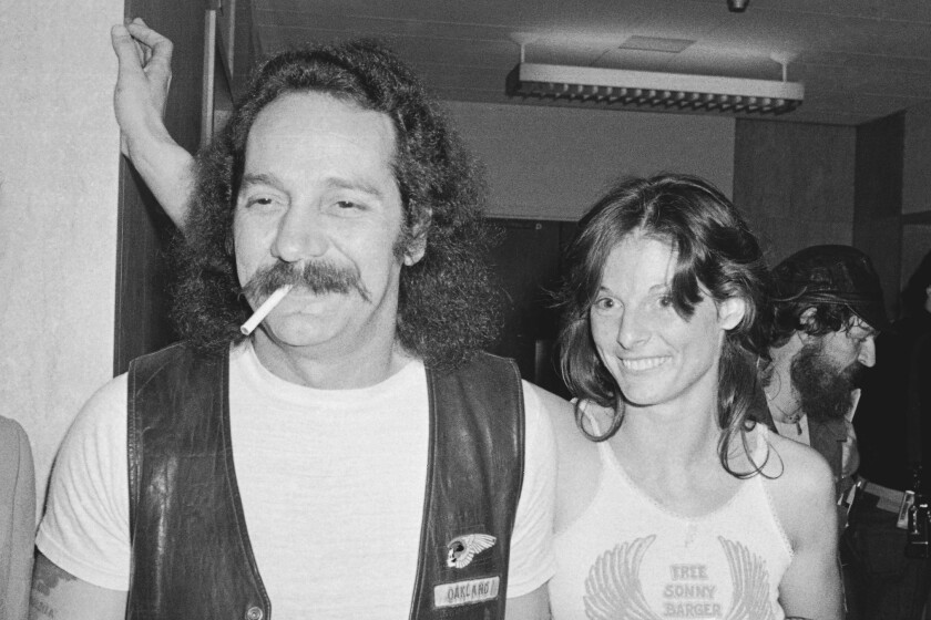 FILE - Hells Angels founder Ralph "Sonny" Barger and his wife Sharon are shown after his release on $100,000 bond in San Francisco, Aug. 1, 1980. Barger, the leather-clad figurehead of the notorious Hells Angels motorcycle club, has died at age 83. Barger's death was announced late Wednesday, June 29, 2022, on his Facebook page. Barger composed the post placed on the Facebook page managed by his current wife, Zorana. (AP Photo/Robert Houston, File)