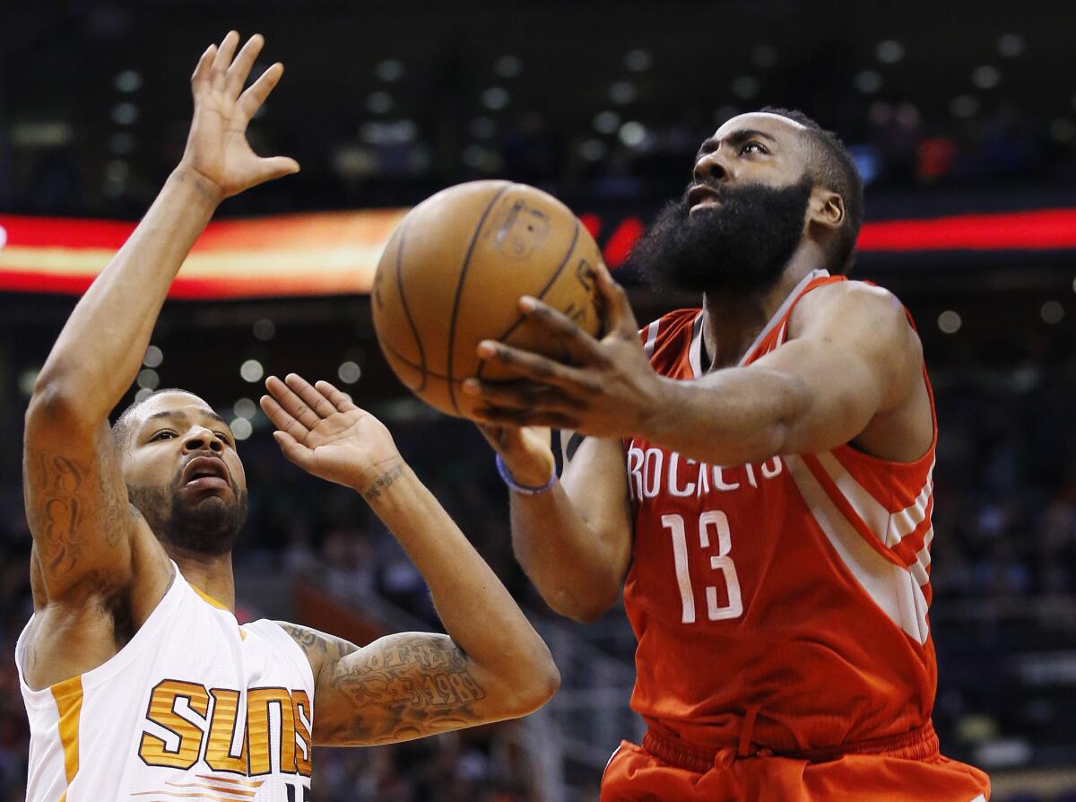 Houston guard James Harden had 40 points with 12 rebounds in the Rockets' 127-118 victory over the Phoenix Suns on Tuesday at US Airways Center.