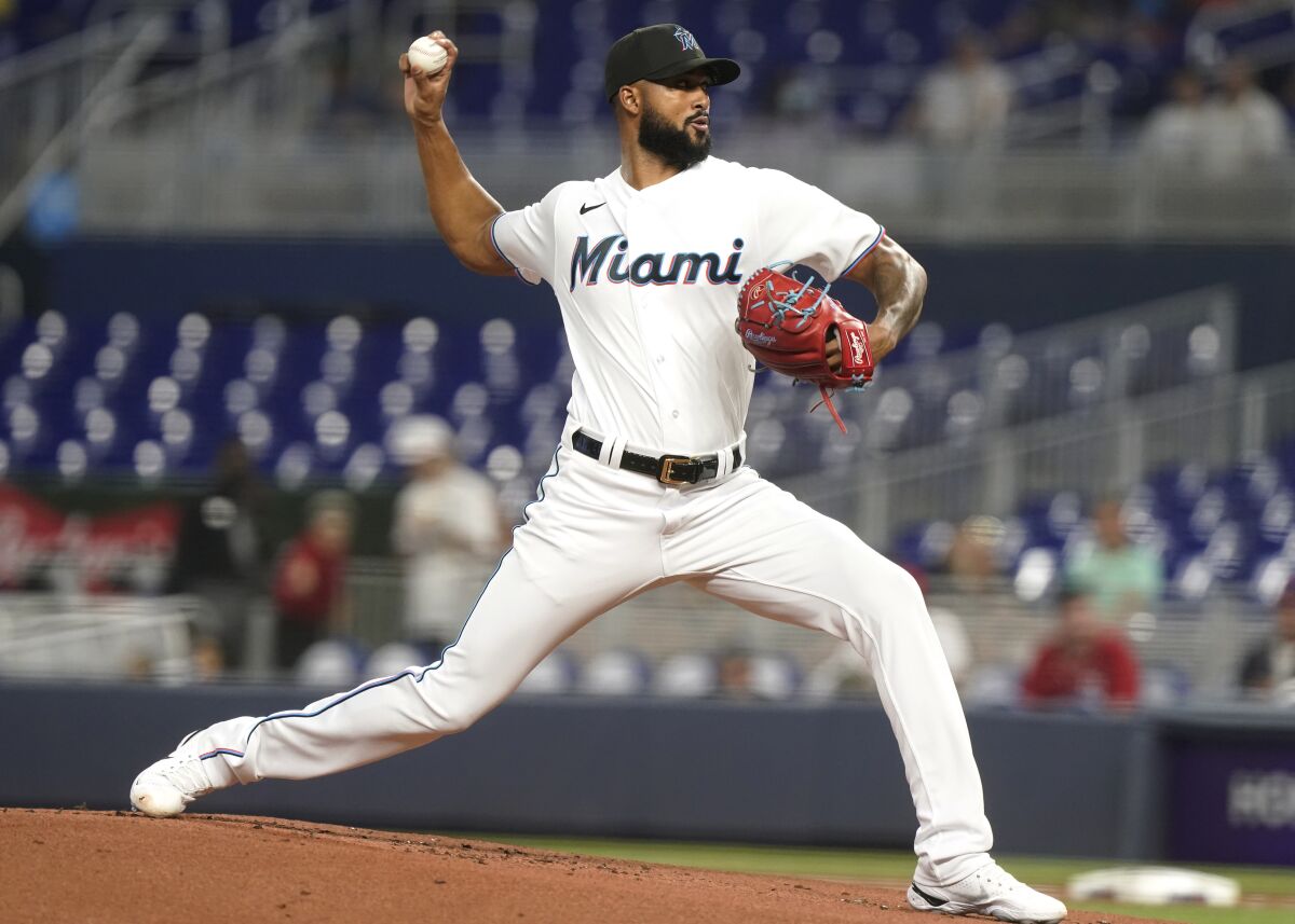 Miami Marlins starting pitcher Sandy Alcantara throw a pitch in the first inning of a baseball game against the Washington Nationals, Wednesday, June 8, 2022, in Miami. (AP Photo/Marta Lavandier)