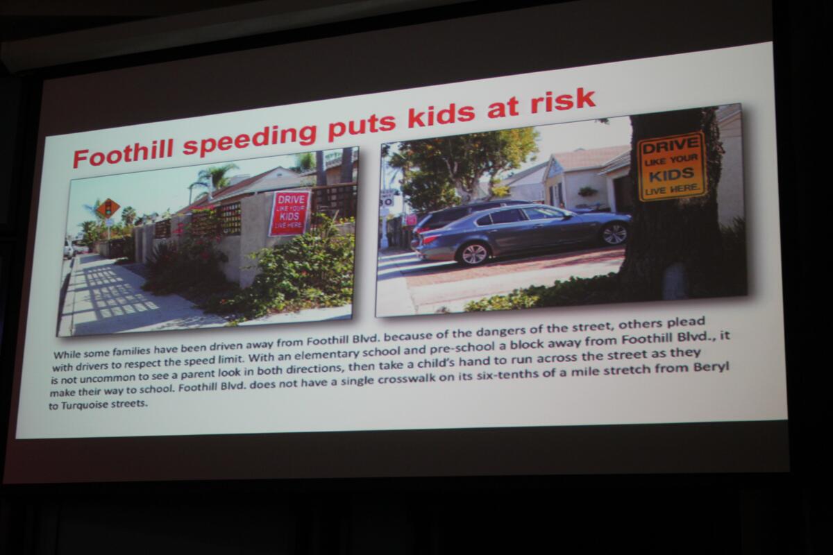 This ‘slide’ in Tom Coat's presentation reads: ‘While some families have been driven away from Foothill Boulevard because of the street, others plead with drivers to respect the speed limit. With an elementary school and preschool a block away, it is not uncommon to see a parent look in both directions, then take a child’s hand to run across the street as they make their way to school. Foothill Boulevard does not have a single crosswalk on its six-tenths of a mile stretch from Beryl to Turquoise streets.’
