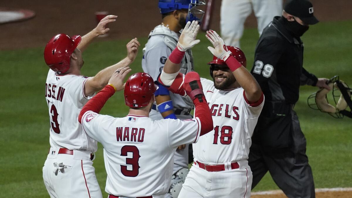 Texas Rangers designated hitter DJ Peters (38) reacts after flying