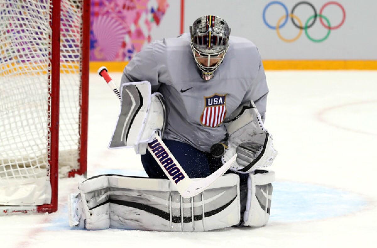 Goaltender Jonathan Quick makes a stop during a U.S. team practice session at the Bolshoy Ice Dome.