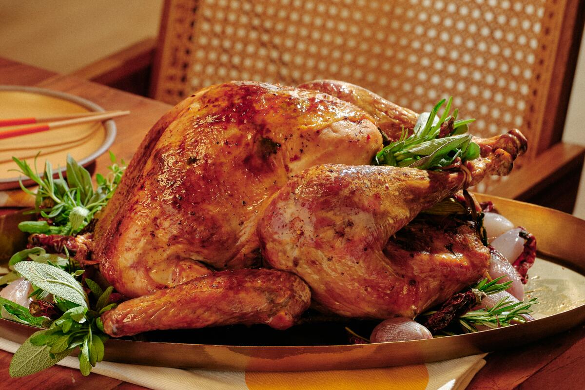 A roasted turkey on a platter