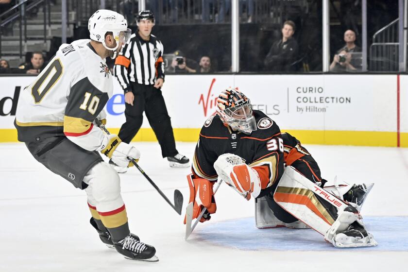 Vegas Golden Knights center Nicolas Roy (10) scores against Anaheim Ducks goaltender John Gibson.