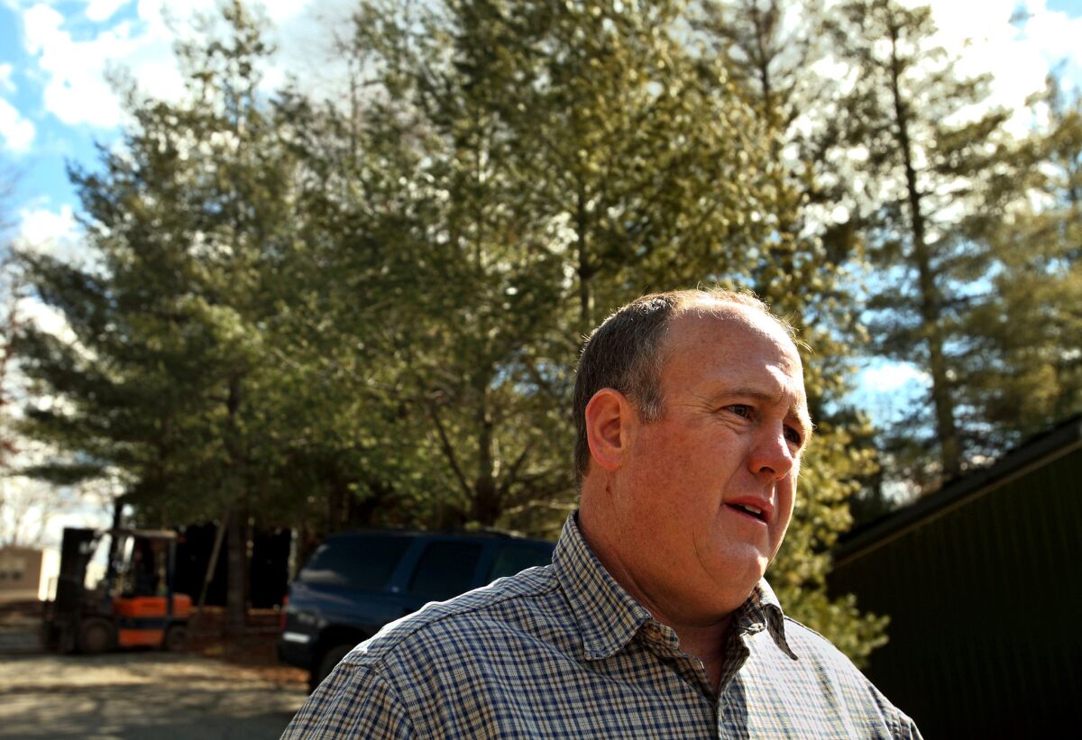 Rusty Barr owns Barr Evergreens in Crumpler, N.C. He uses Mexican workers under the H-2A visa program, but he says the costs can put him at a disadvantage with operations that use undocumented workers.