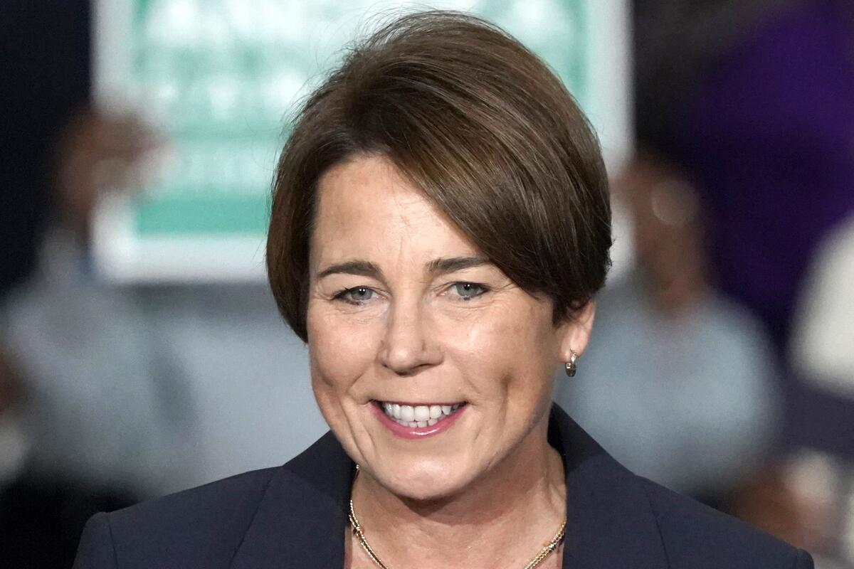 Maura Healey smiles as she speaks during a campaign rally