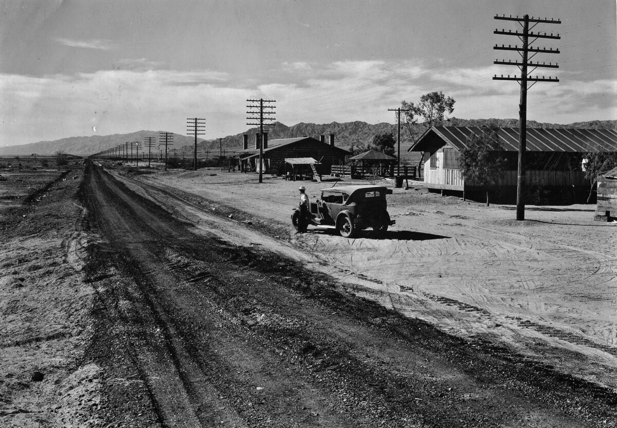 June 1934: View of the newly oiled Salton Sea North Shore road with The Times-Auto Club car.