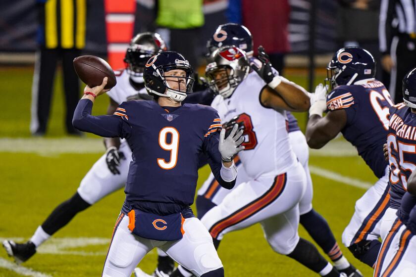 Chicago Bears quarterback Nick Foles (9) throws in the first half of an NFL football game against the Tampa Bay Buccaneers in Chicago, Thursday, Oct. 8, 2020. (AP Photo/Nam Y. Huh)