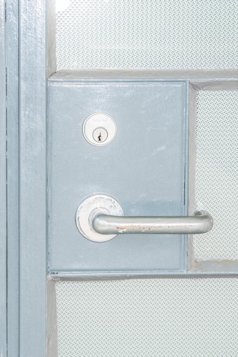 The metal doorknob of the Aluminaire House.