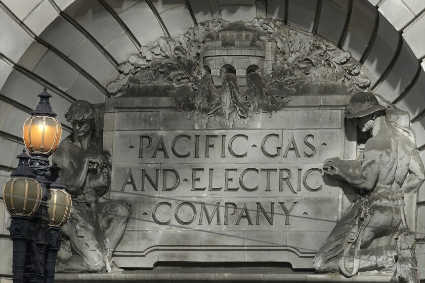 A Pacific Gas & Electric sign is shown outside of a PG&E building in San Francisco.