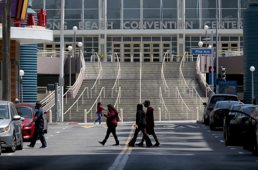 People walking in front of the Long Beach Convention Center