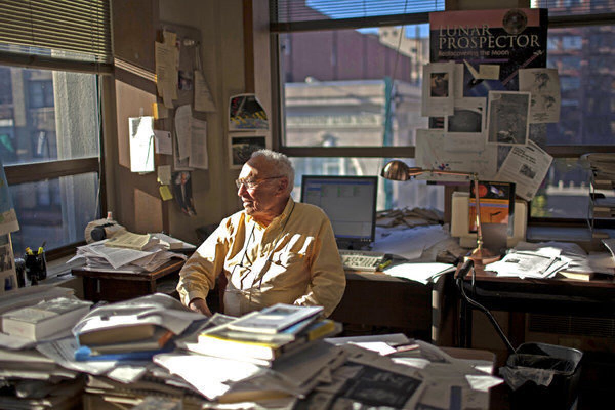 David Perlman sits at his desk at the San Francisco Chronicle, where he has been a reporter for 63 years. His favorite kind of story is equal parts physical adventure, scientific discovery and opportunity to watch brilliant researchers at work.