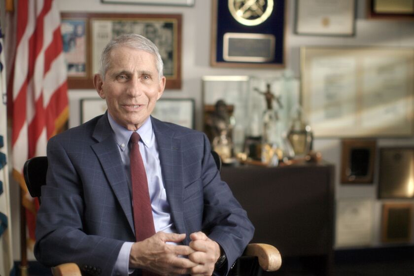 This image released by National Geographic shows Dr. Anthony Fauci at the NIH in Bethesda, Md., during the filming of the documentary "Fauci." (Visko HatfNational Geographic via AP)