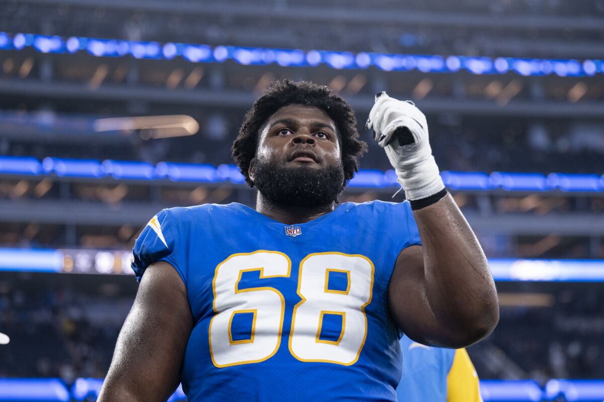 Chargers offensive lineman Jamaree Salyer (68) walks to the locker room after a preseason game.