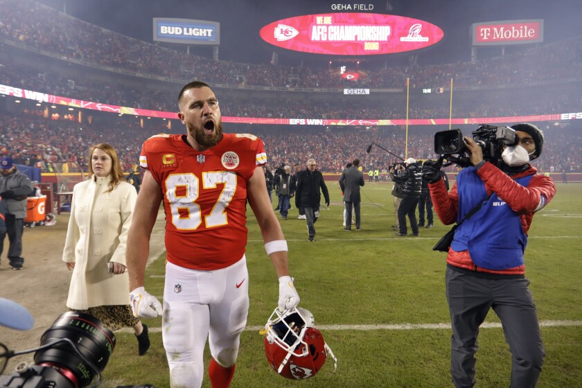 Kansas City Chiefs tight end Travis Kelce (87) walks off the field after an NFL divisional round playoff football game against the Buffalo Bills, Sunday, Jan. 23, 2022, in Kansas City, Mo. The Chiefs won 42-36 in overtime. (AP Photo/Colin E. Braley)