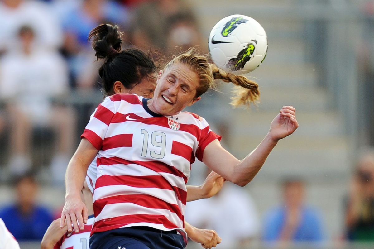 U.S. defender Rachel Buehler heads the ball during a match against China in May 2012.