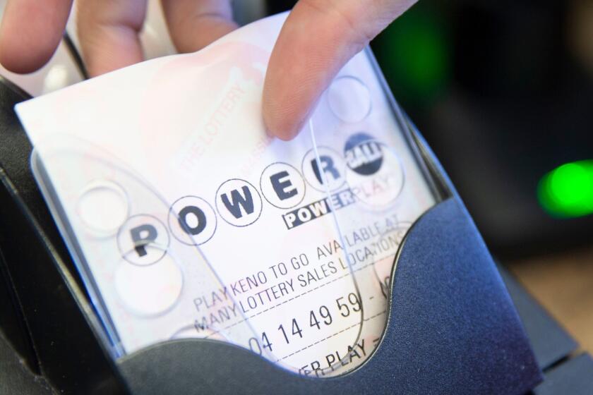 Mandatory Credit: Photo by CJ GUNTHER/EPA-EFE/REX (10180036c) Customers purchase Powerball tickets at Ted's Stateline Mobil in Methuen, Massachusetts, USA, 27 March 2019. The estimated Powerball jackpot for 27 March 2019 is 750 million dollars (665.7 million euros), the fourth largest jackpot in US history. Powerball Sales in Massachusetts, Methuen, USA - 27 Mar 2019 ** Usable by LA, CT and MoD ONLY **