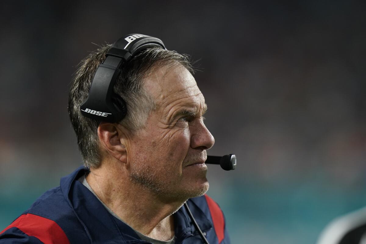 New England Patriots head coach Bill Belichick watches from the sidelines.