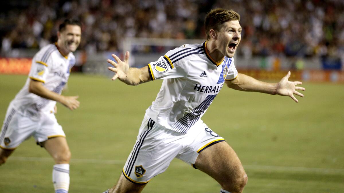 Galaxy midfielder Steven Gerrard celebrates after scoring his first goal for his new team in a game against the Earthquakes on Friday night in San Jose.