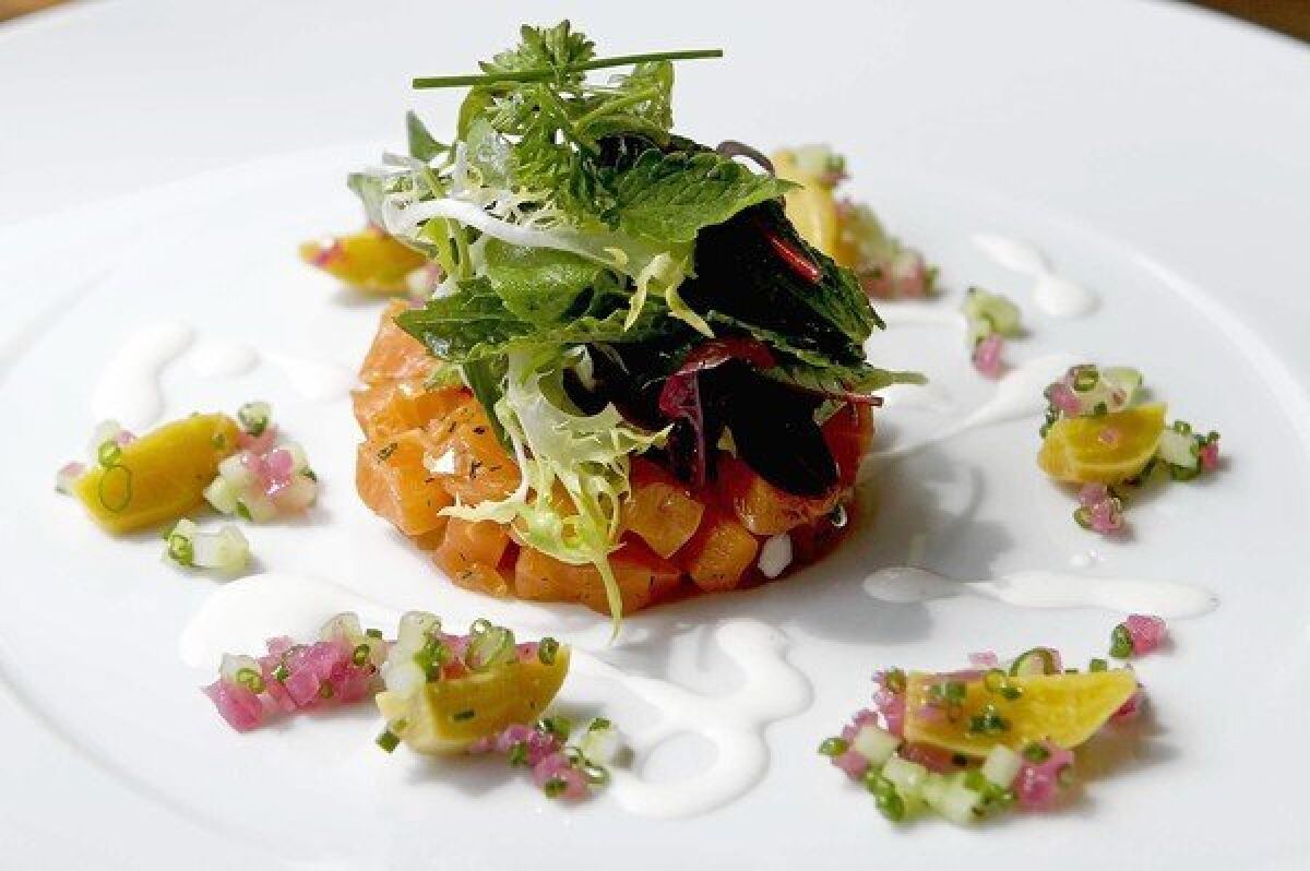 House-cured char with heirloom beets, fresh horseradish and tossed herb salad.