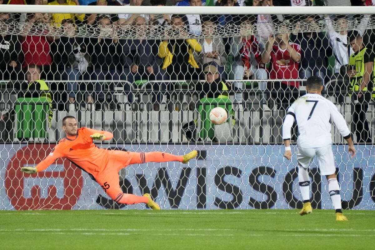 Manchester United's Cristiano Ronaldo scores his side's second goal on a penalty lick during the Europa League, group E soccer match between Sheriff Tiraspol and Manchester United at the Zimbru stadium, in Chisinau, Moldova, Thursday, Sept. 15, 2022. (AP Photo/Sergei Grits)