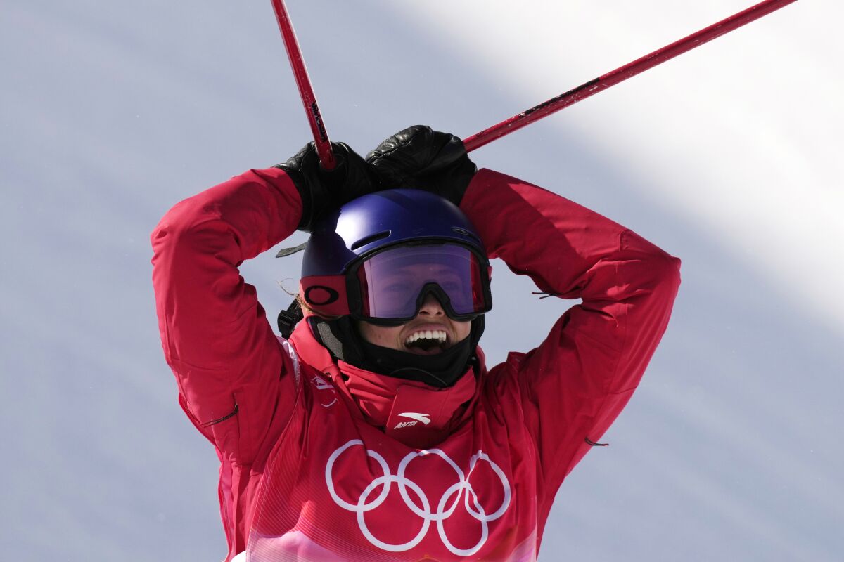 Eileen Gu celebrates after winning a gold medal during the 2022 Winter Olympics in China on Feb. 18.