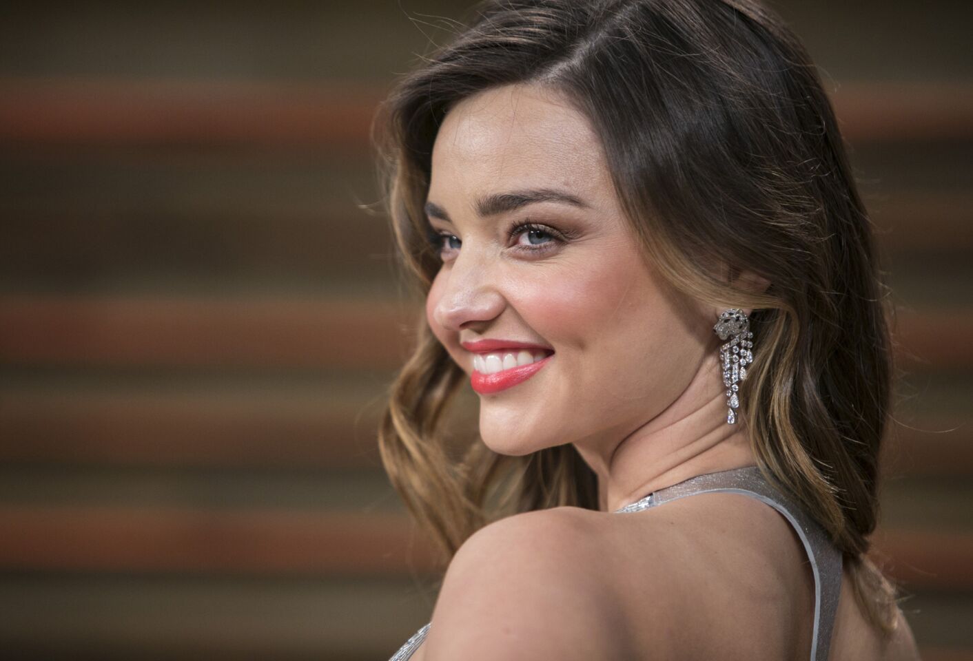 Victoria's Secret model Miranda Kerr, no stranger to showing some skin, experienced an unforeseen fashion mishap on the set of her skin-care line's ad campaign. Her chunky black sweater took a plunge, revealing both her breasts. Kerr was caught in a similar situation a few months later when a sheer black lace gown also gave way.