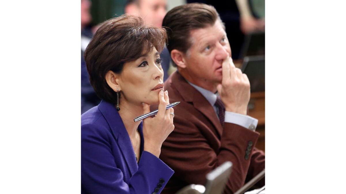 A 2015 file photo of Republican Assembly members Young Kim, of Fullerton, and Brian Jones, of Santee, at a budget hearing at the state Capitol. Kim's campaign says someone stole 30 tablets and a laptop computer from her Orange County campaign office.