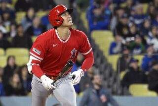 Angels star Shohei Ohtani runs to first as he flies out against the Dodgers 
