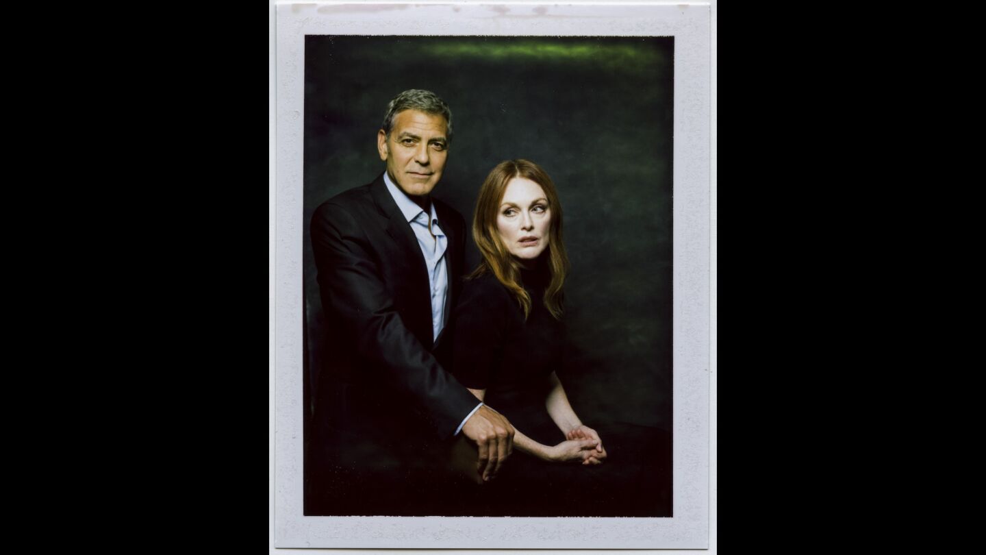 Director George Clooney and actress Julianne Moore, from the film "Suburbicon."