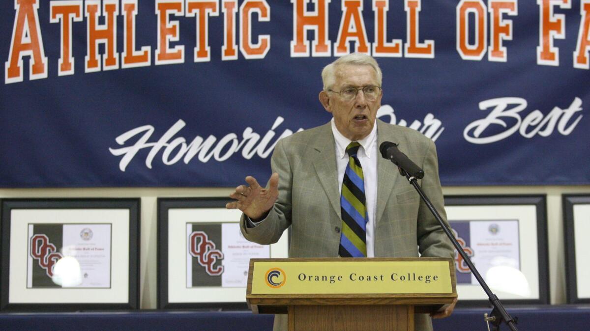 The late Dick Tucker, seen here in 2007, shares memories of his time coaching at Orange Coast College as he is inducted into the OCC Athletic Hall of Fame during a ceremony at the Peterson Gymnasium on campus.