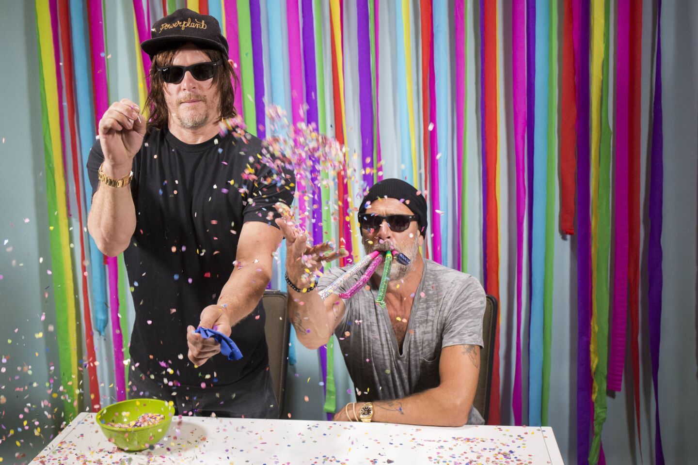 It's all confetti and party horns for "The Walking Dead's" Norman Reedus, left, and Jeffrey Dean Morgan.