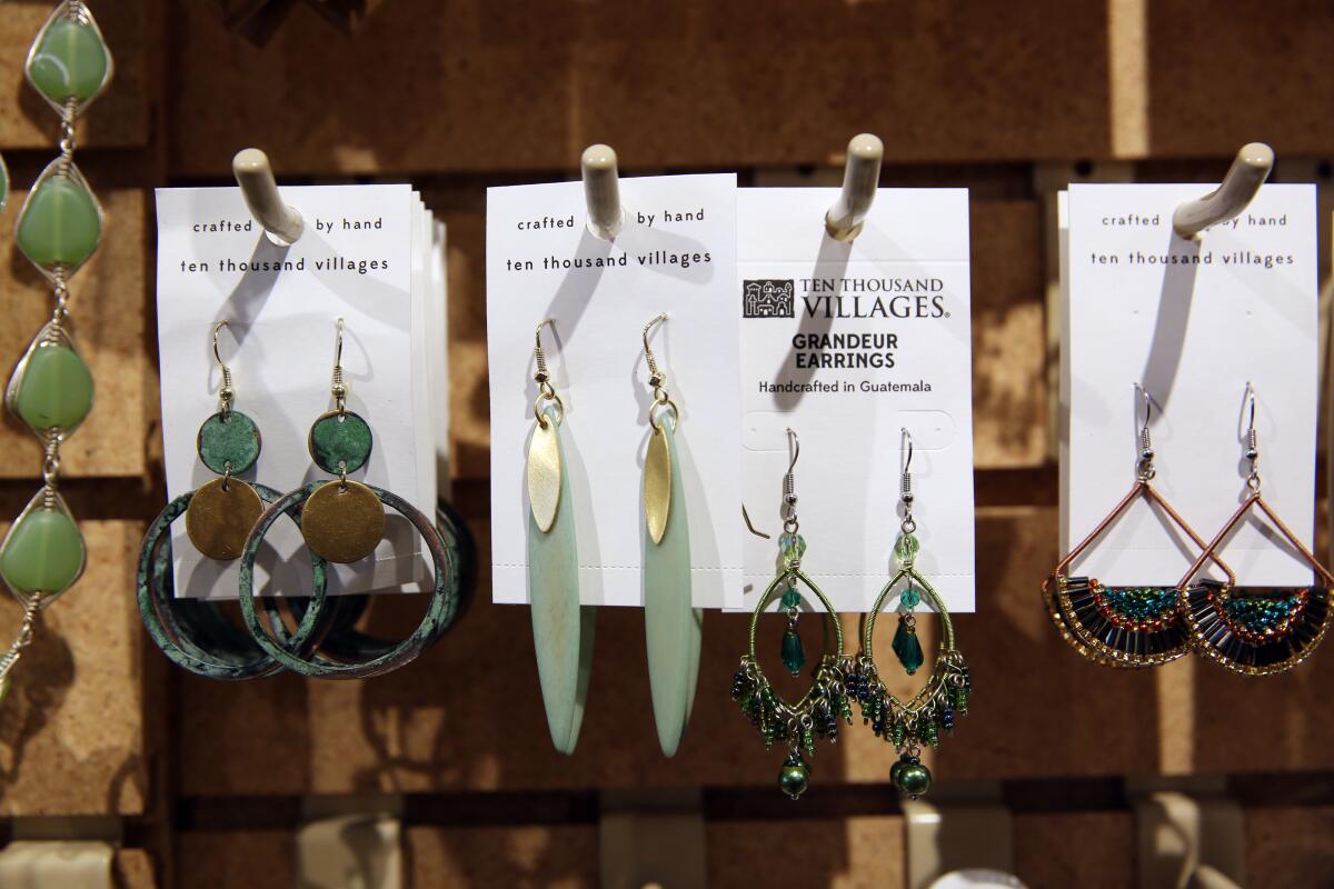 Earrings are on display at Ten Thousand Villages, a nonprofit fair trade organization that markets handcrafted products made by disadvantaged artisans from more than 35 countries.