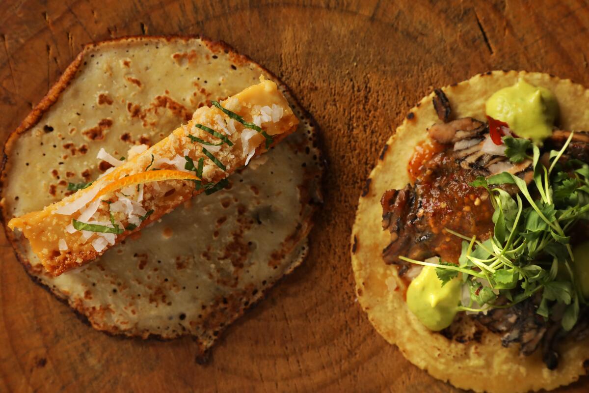 A flan taco, left, and black trompo taco from Evil Cooks.