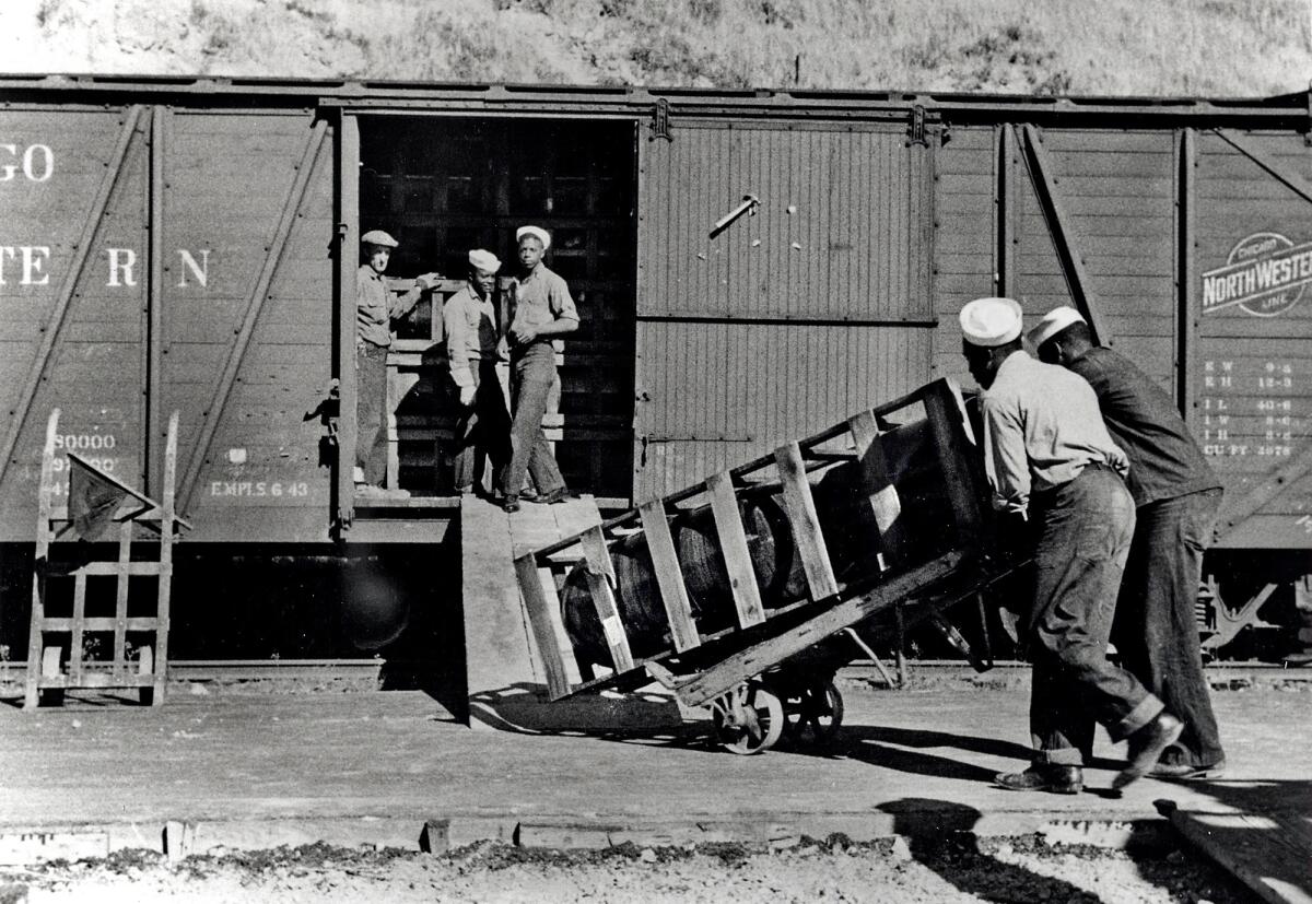 PORT CHICAGO, CA, NEAR SF BAY AREA: Historical photo taken after the blast of some 5000 tons of TNT that rocked the U.S. Navy's Port Chicago on July 17, 1944, kiling 320 people. Here Navy personnel are loading munitions on a boxcar. PHOTO CREDIT: National Park Service, Port Chicago Naval Magazine National Memorial, U.S. Navy.
