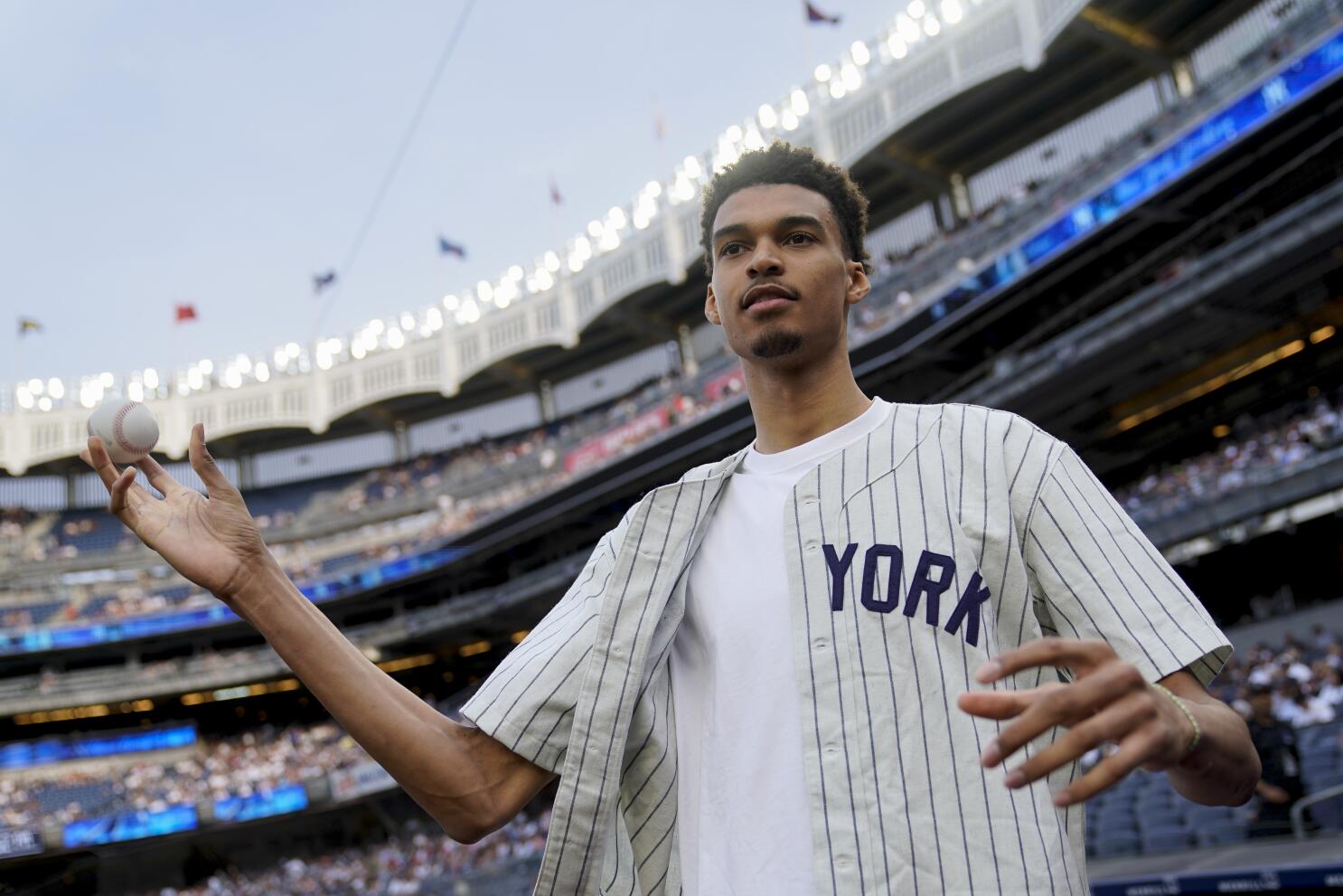 Victor Wembanyama Takes the Subway to Yankee Stadium to Throw First Pitch -  The New York Times